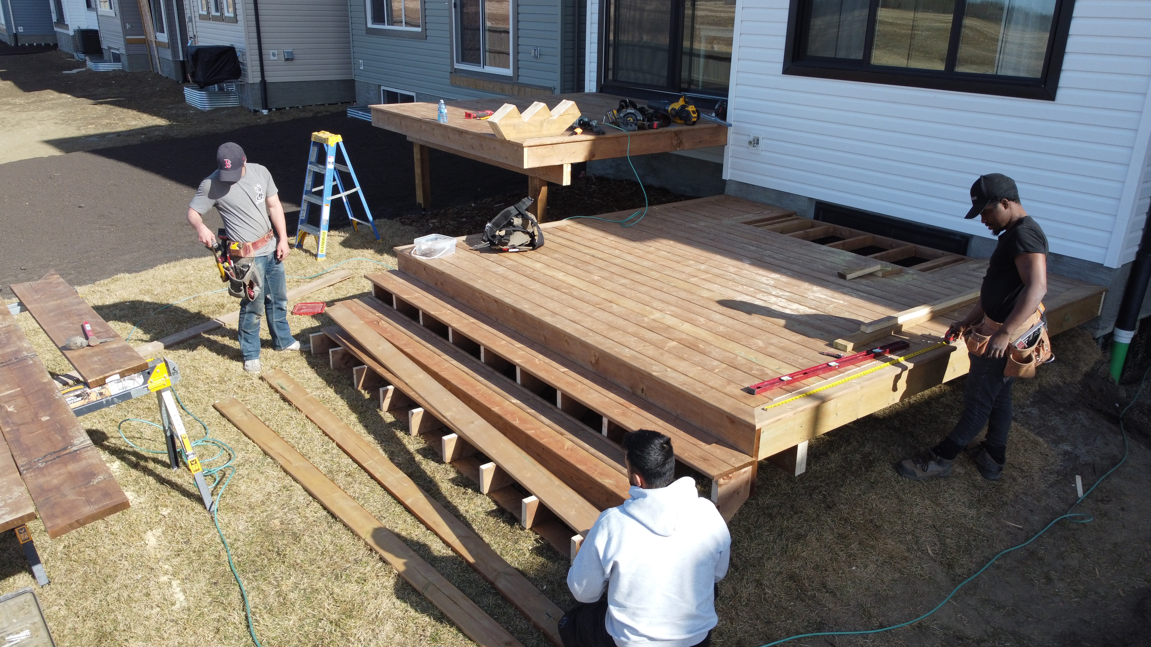 Crestfield Decking crew building a custom deck in Edmonton Alberta