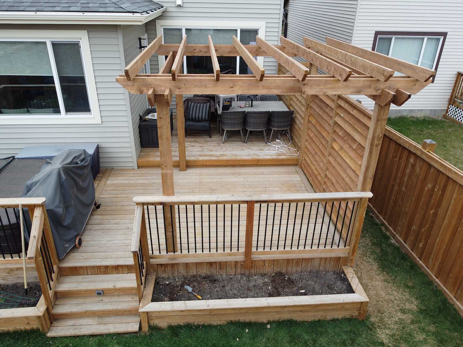 Overhead view of custom pergola with privacy screen built by Crestfield Decking in Edmonton, Alberta